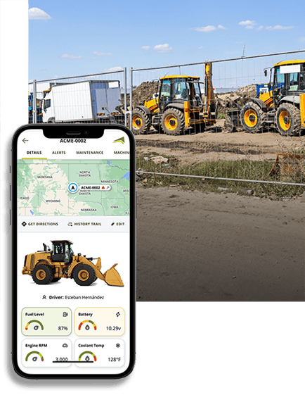 Fenced Construction site with yellow equipment and mobile phone with ascend construction fleet app